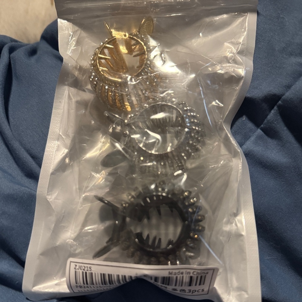Set of Gold, Silver, and Black Hair Clips